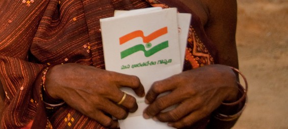 Woman holding land title in Andhra Pradhesh, India